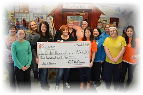 Ascentra Credit Union Paws It Forward body image Donation check presented to Clinton Humane Society