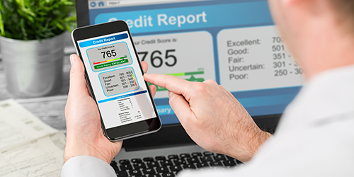 Man checking his credit report on phone