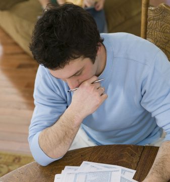 Man-doing-taxes