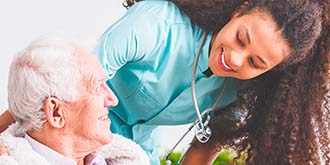 Woman helping elderly man