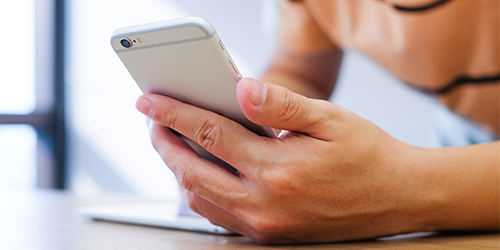 Member receives a text alert on phone.