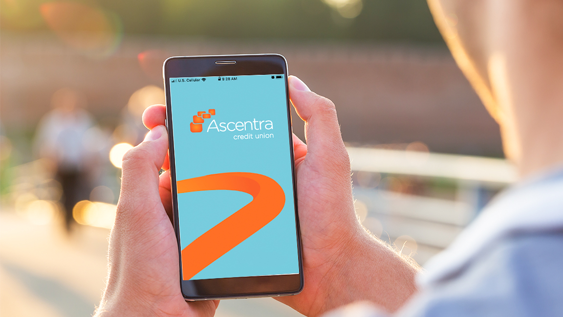 Someone using the Ascentra Credit Union mobile app Someone using the Ascentra Credit Union mobile app