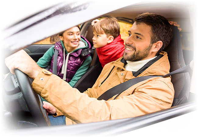 Family driving new car