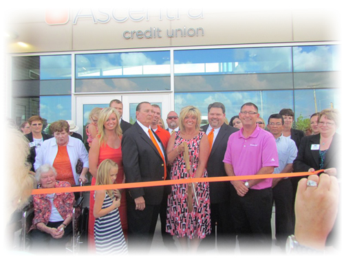 Ribbon cutting at Ascentra E53 Ascentra team cuts the ribbon